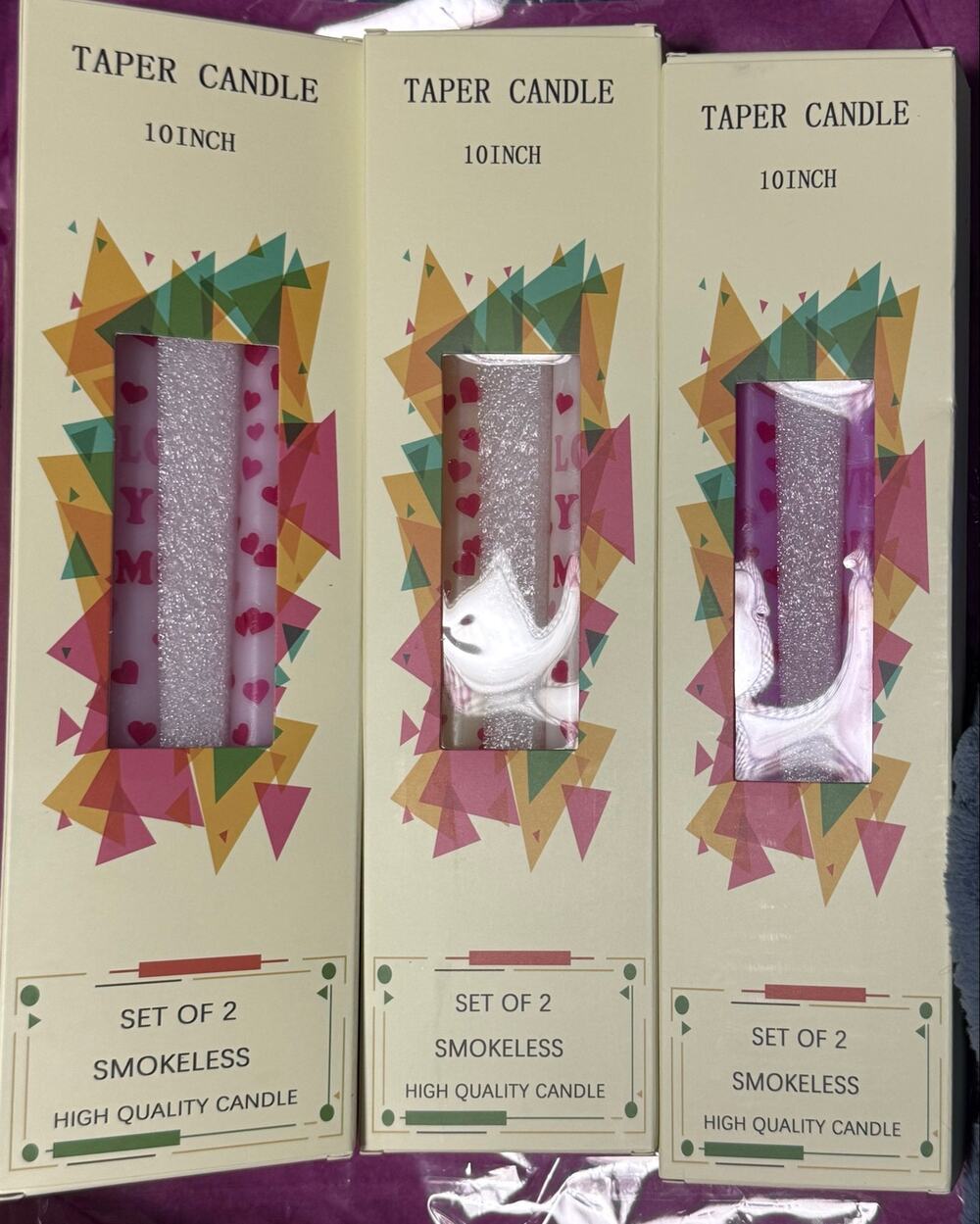 Pack of 6 Love You Mom 10” taper candles, pink, white, yellow and purple.